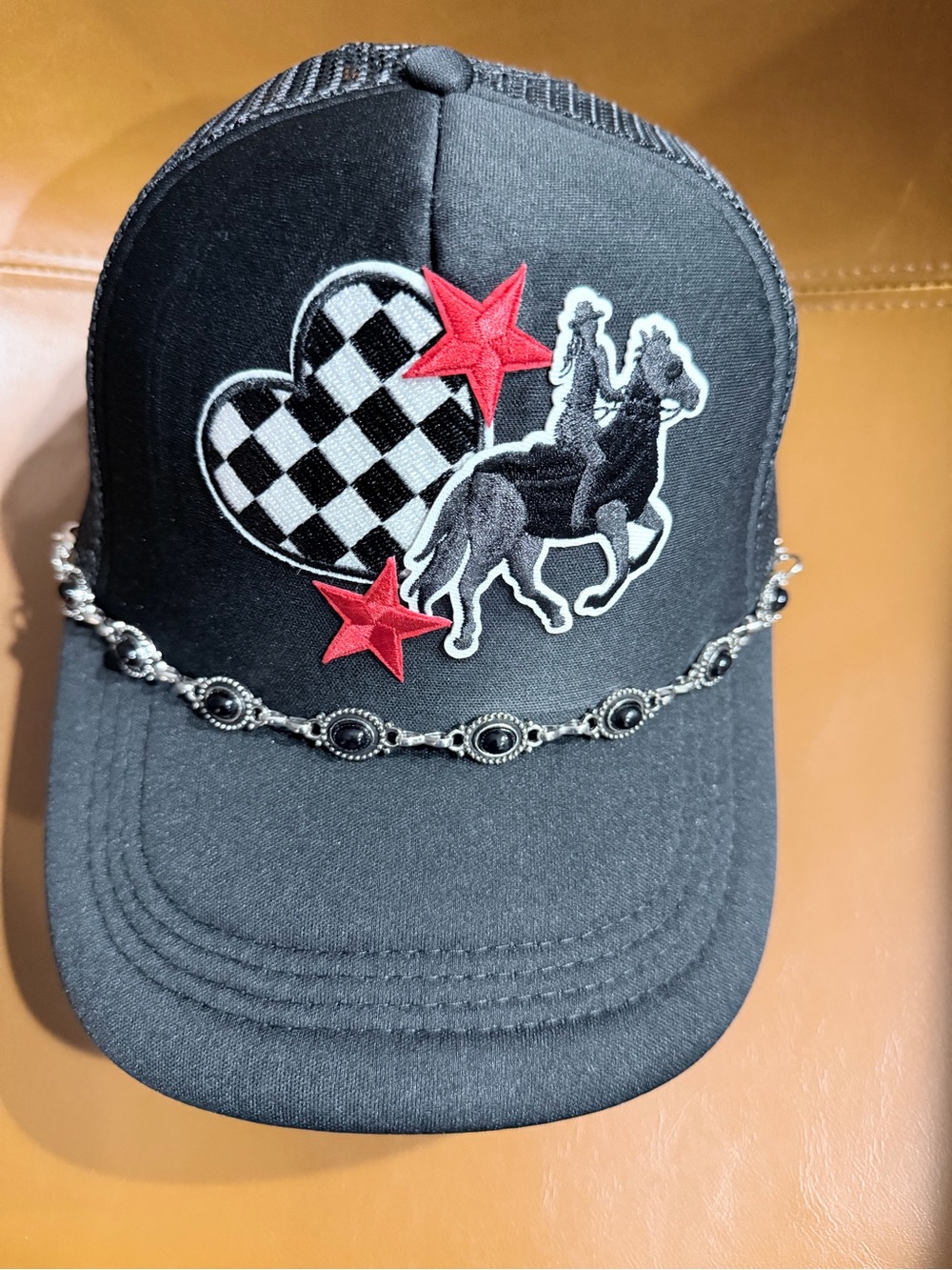 Black Trucker Hat with Checker Heart, Cowboy Patch & Red Stars